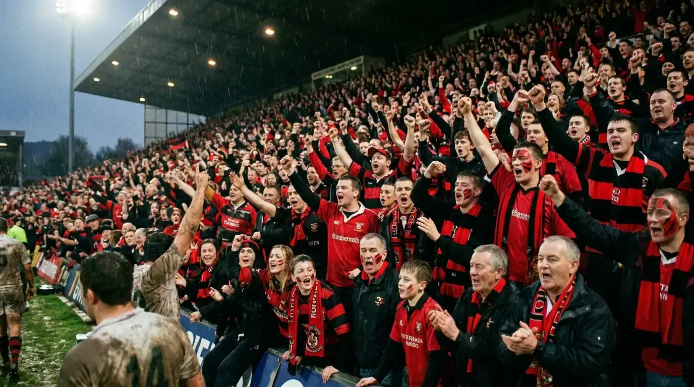 Premiership rugby home crowd celebrating a try at a club ground